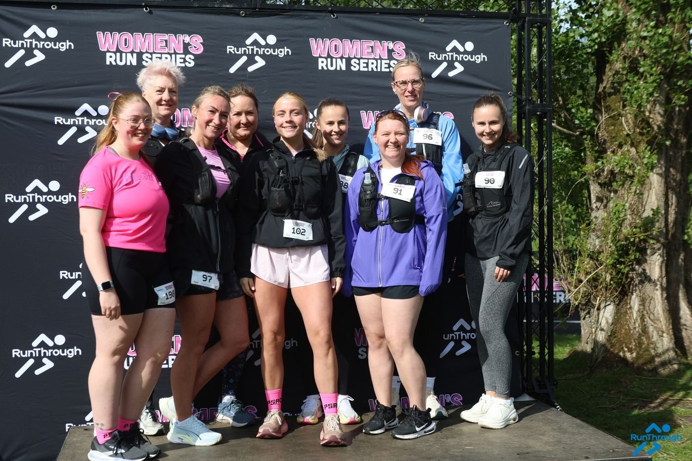 A group of runners at the Women's Run Series backdrop, Heaton Park