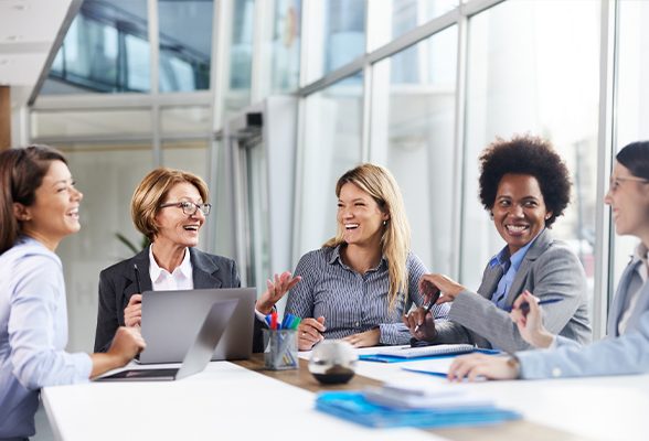 Women of StoneX colleagues in a meeting